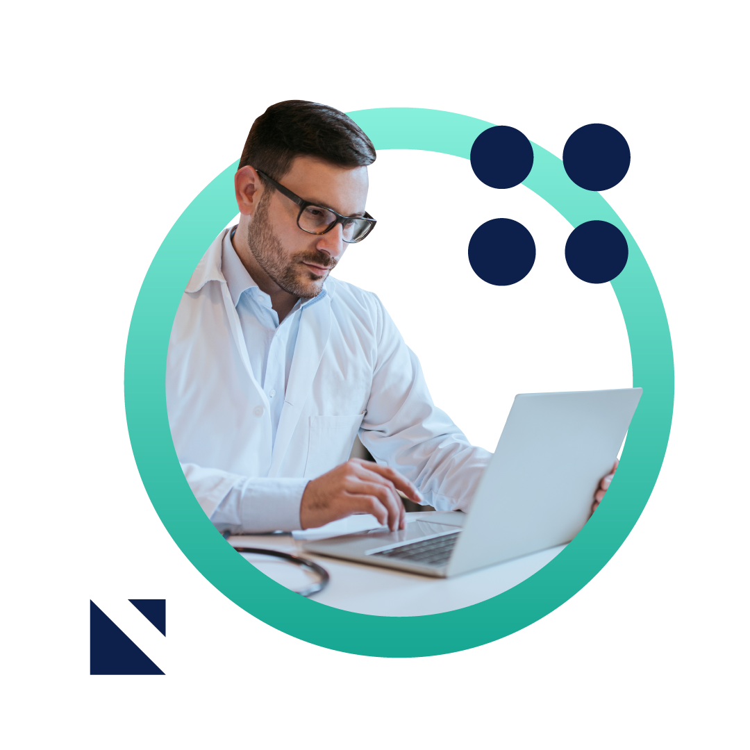 A doctor working at his desk, smiling and typing on his laptop. The image is placed inside a graphic green circle.