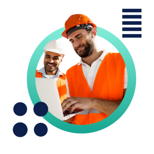 A woman wearing a construction vest and holding a tablet while on a job site.