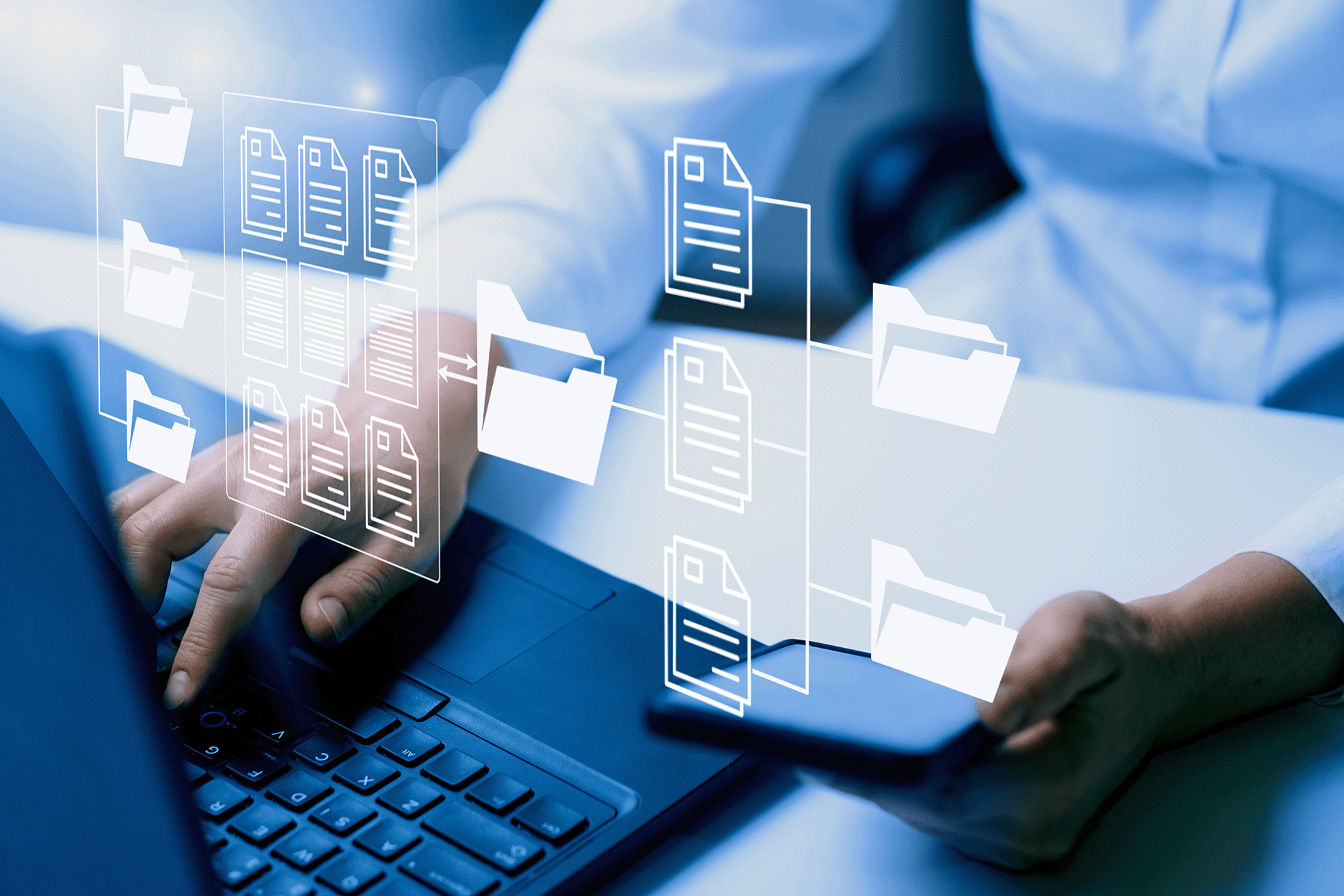 A blue-tinted image with a businessperson's hands typing on a laptop and artificial folders and documents illustrated over it.