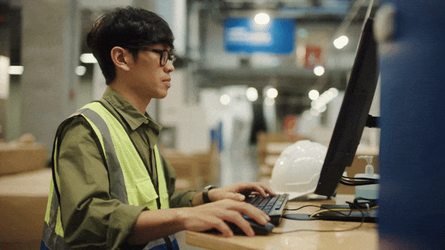 A conference room with three businessmen collaborating and the text "Rude errors by 52%".