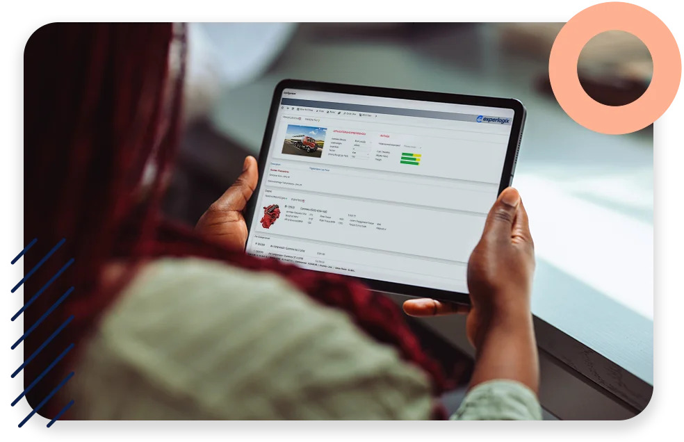 An office with cool lighting and business coworkers sitting at a table in a meeting.