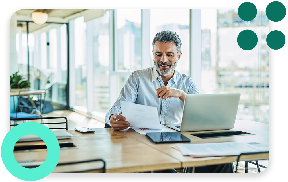 A conference room with three businessmen collaborating and the text "Rude errors by 52%".